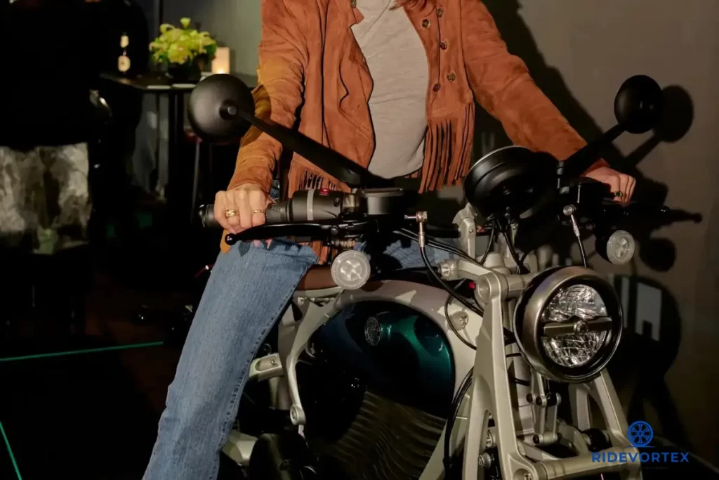 Royal Enfield Flying Flea C6 electric bike front view showing round LED headlamp in army green color